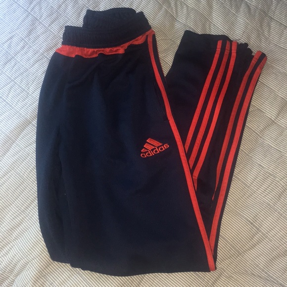 navy blue and red adidas pants